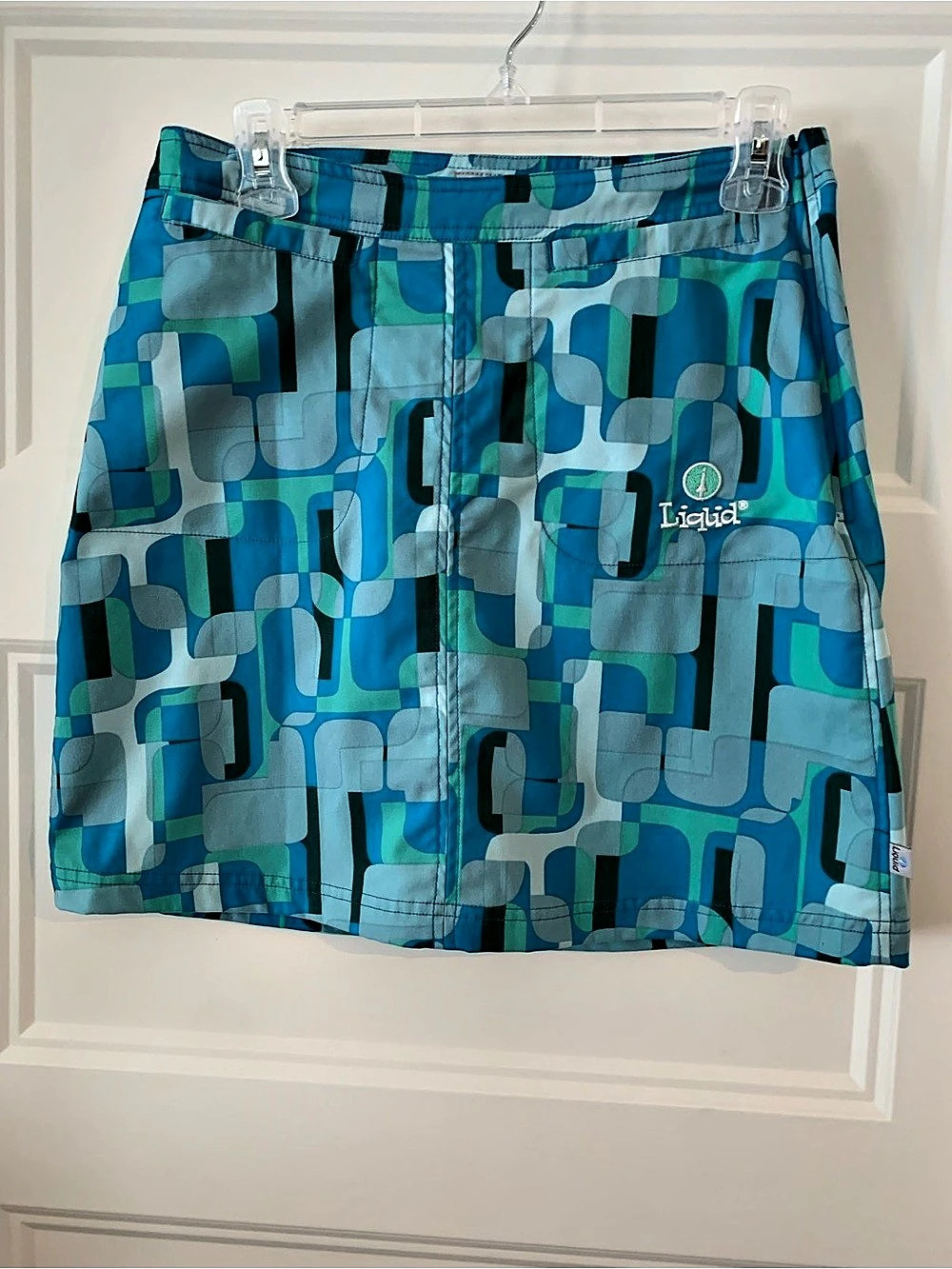 Liquid , Women's Geometric sport mini skirt in Aqua Blues size 8 Like New